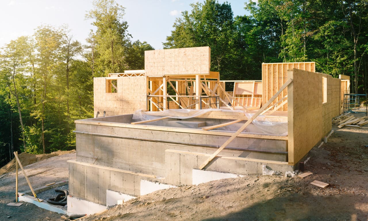 Residential construction site panorama with pool