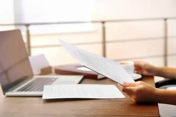 depositphotos 135944764 stock photo lawyer sitting at table