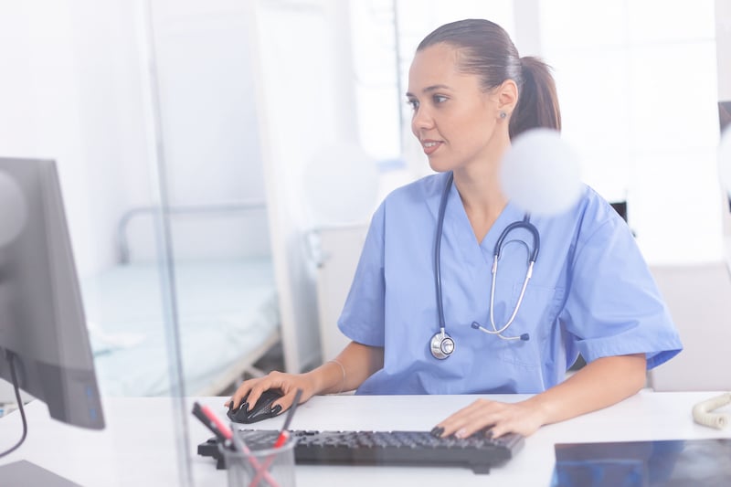 Medical practitioner using computer