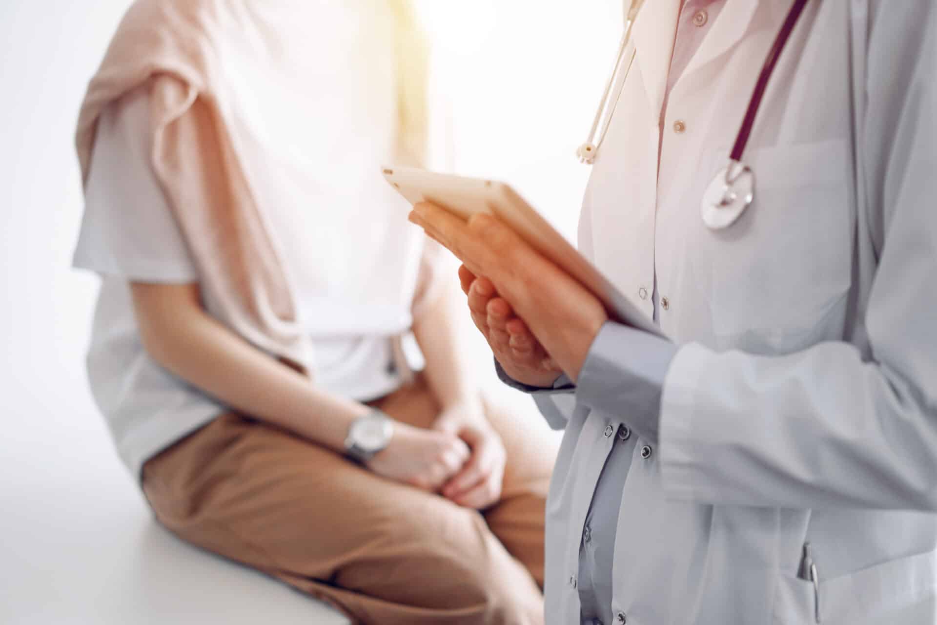 Doctor and patient discussing care quality